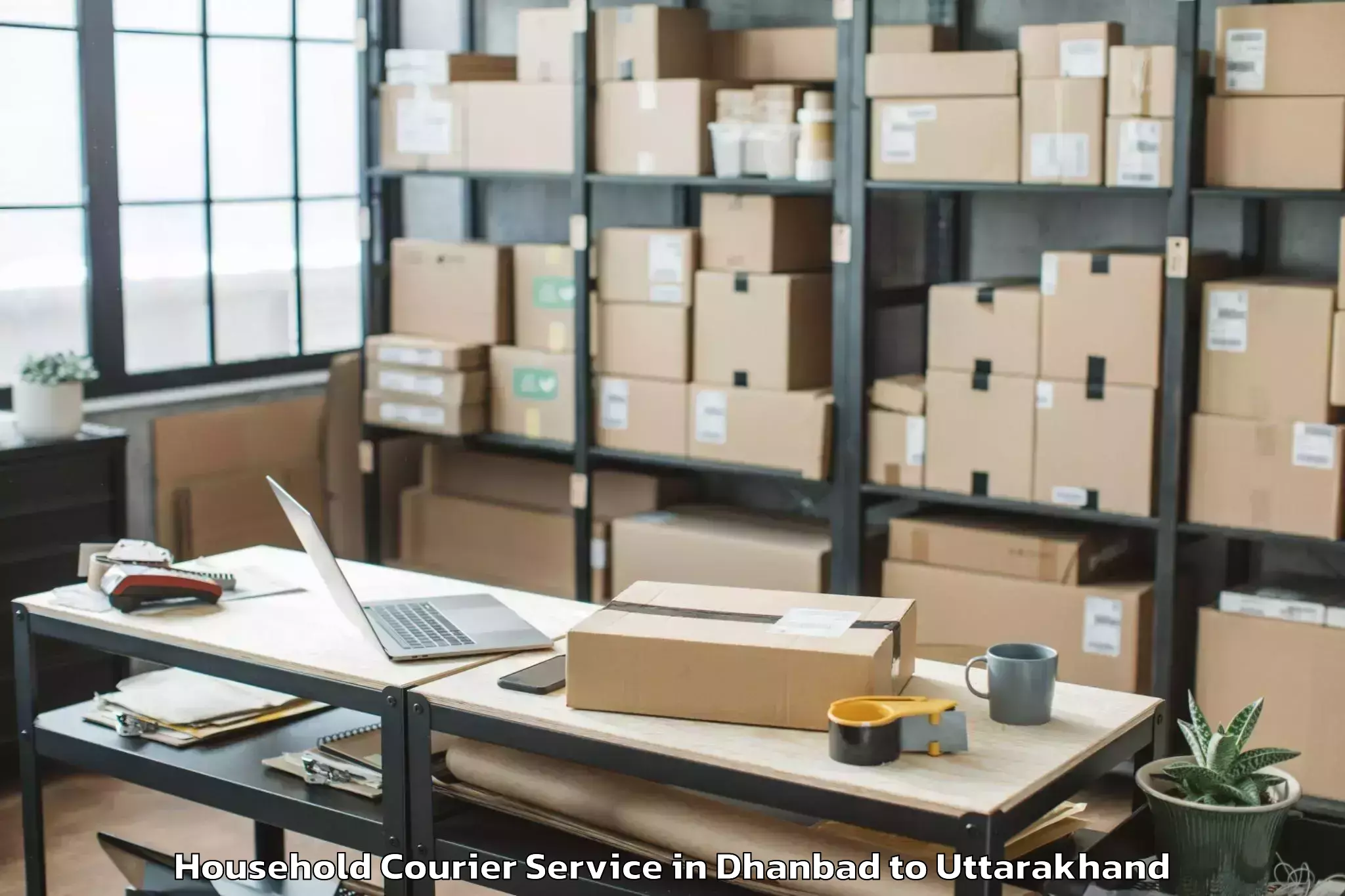 Top Dhanbad to Sitarganj Household Courier Available